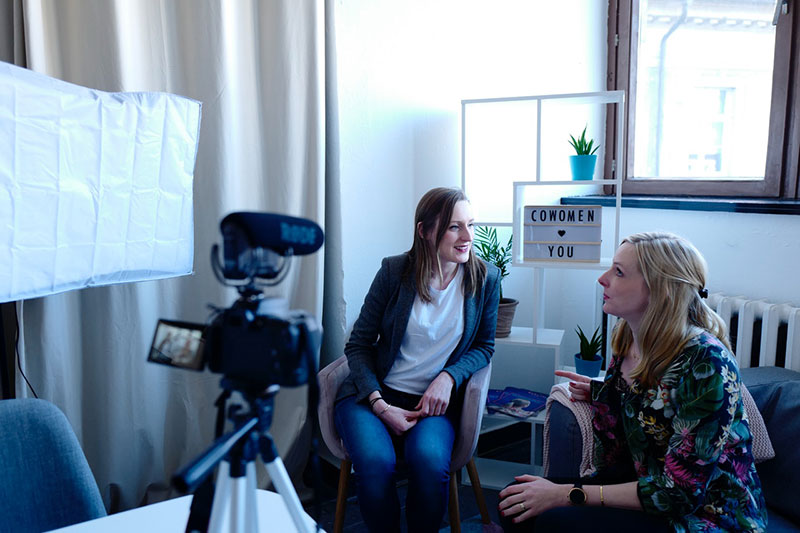 two virtual event speakers recording themselves